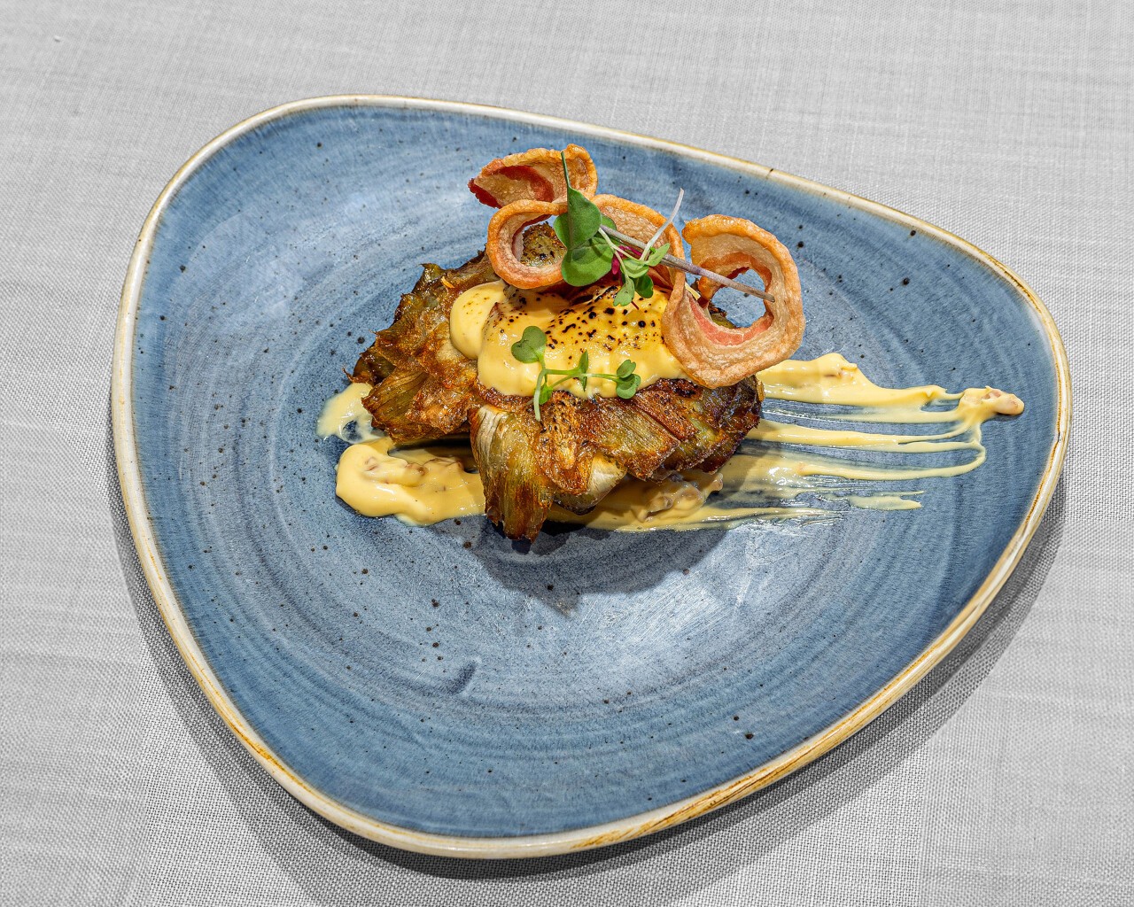 restaurante_larruzz_alcachofas_con_salsa_holandesa_y_torrezno_de_soria_550x440